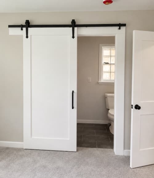 Finished white sliding barn door